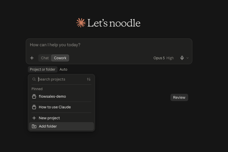 The Claude desktop home screen with Cowork selected and Add folder chosen under Project or folder